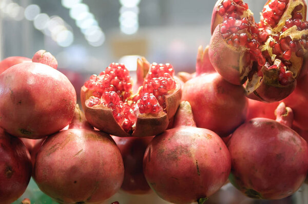 Blurred Pomegranates Fruit in the Supermarket.