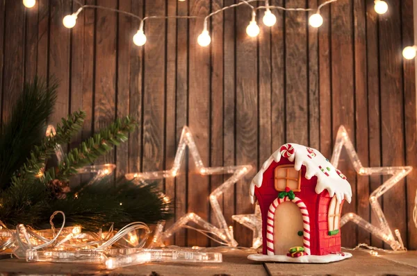 Lights and gingerbread house — Stock Photo, Image