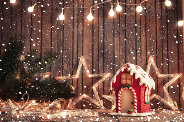 Lights and gingerbread house — Stock Photo, Image