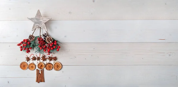 Christmas decorations on holiday kitchen table — Stock Photo, Image