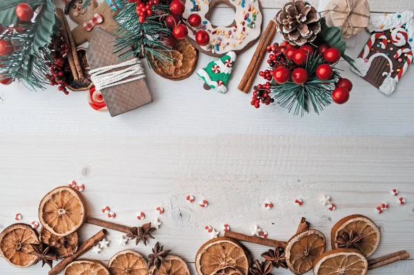 Christmas decorations on holiday kitchen table Royalty Free Stock Photos