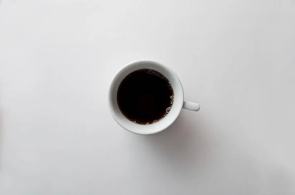 Terug espresso op de witte achtergrond — Stockfoto