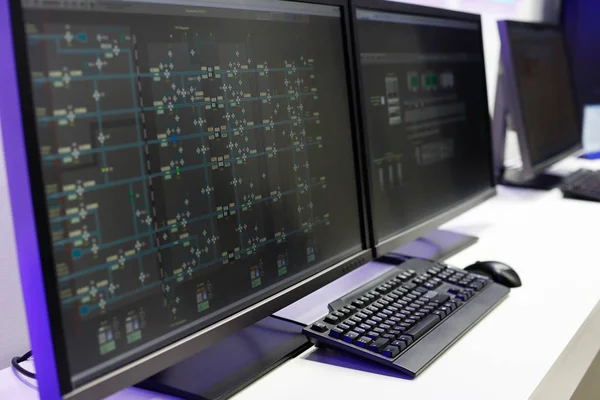 Operator console in a control room Stock Image