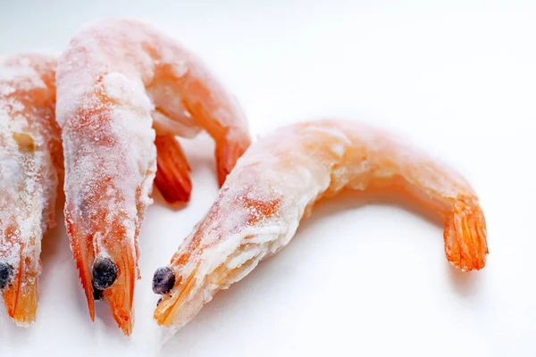Three Frozen Unpeeled Shrimp White Background — Stock Photo, Image