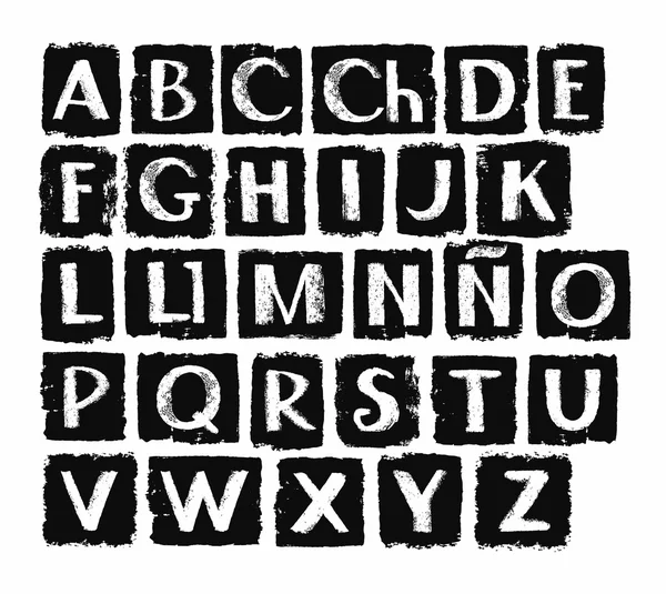 Alphabet espagnol, en lettres majuscules blanches sur fond noir . — Image vectorielle