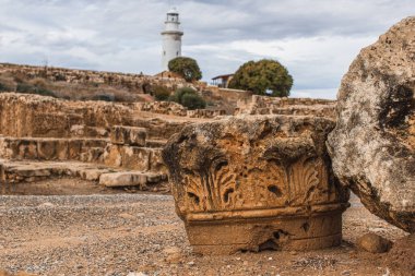 ancient ruins in archaeological park near lighthouse  clipart