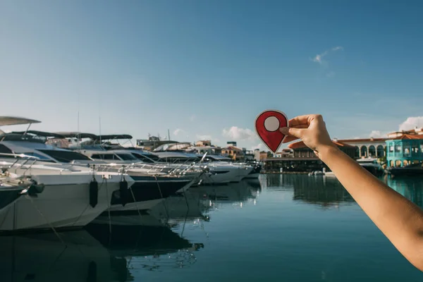 Cropped View Woman Holding Red Paper Location Sign Docked Ships — Stock Photo, Image