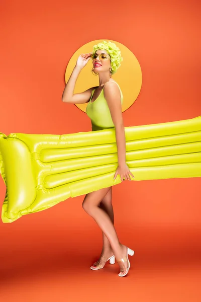 Girl Touching Sunglasses Holding Inflatable Mattress Yellow Circle Orange — Stock Photo, Image
