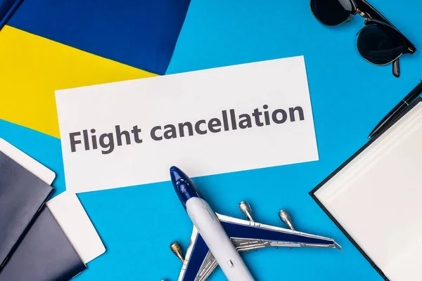 Top View Card Flight Cancellation Toy Plane Flag Ukraine Passports — Stock Photo, Image