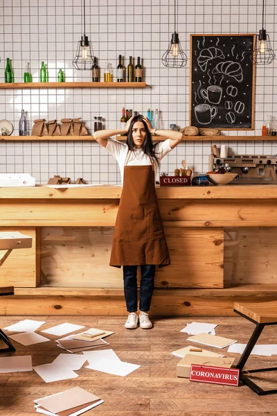 Stressed Cafe Owner Touching Head Looking Camera Table Papers Floor — Stock Photo, Image