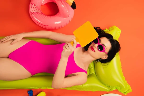 Top View Woman Sunglasses Swimsuit Lying Inflatable Mattress Looking Mirror — Stock Photo, Image