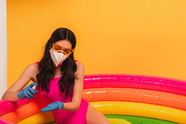 Young Woman Swimsuit Sunglasses Latex Gloves Medical Mask Sitting Inflatable — Stock Photo, Image