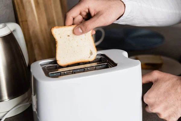 Cropped View Man Putting Piece Bread Toaster — Stock Photo, Image