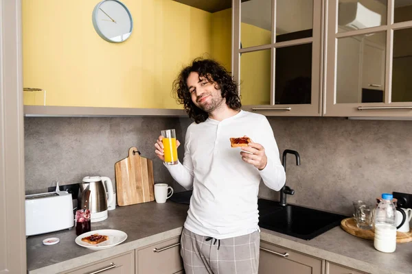 Happy Man Pajamas Holding Orange Juice Toast Jam While Smiling — Stock Photo, Image