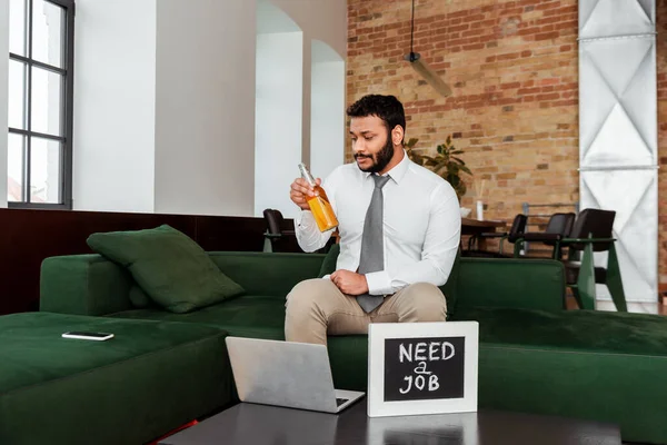 Unemployed African American Man Holding Beer Bottle Chalkboard Need Job — Stock Photo, Image