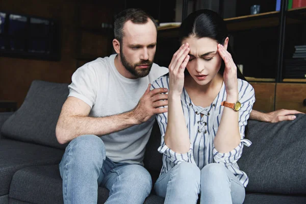 Husband asking forgiveness from wife after quarrel at home — Stock Photo