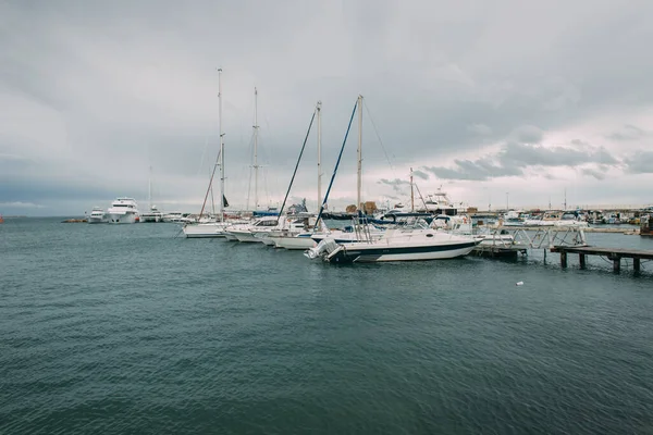 White yachts in mediterranean sea against sky with clouds — Stock Photo