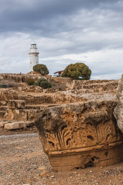 Selective focus of ancient ruins in archaeological park near lighthouse — Stock Photo