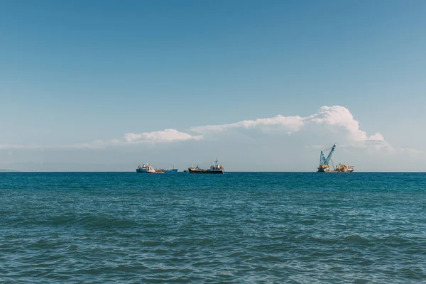 Ships in blue mediterranean sea against blue sky — Stock Photo