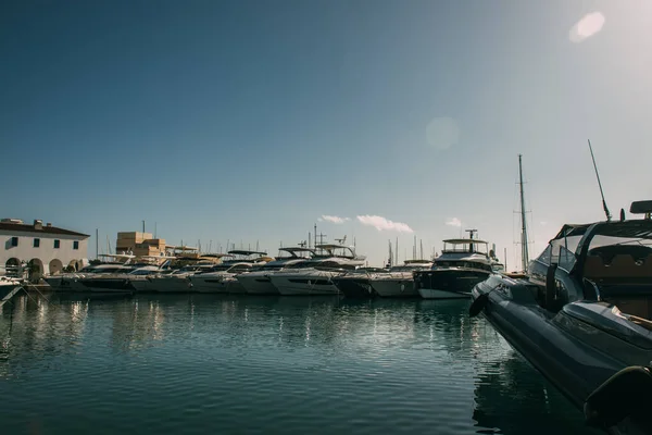 Docked modern and white yachts in mediterranean sea — Stock Photo