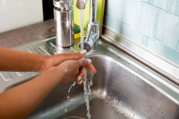 Cropped view of african american girl washing hands — Stock Photo