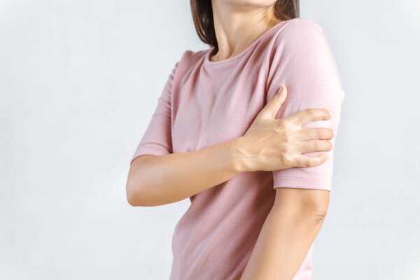 Arms Pain. Beautiful Woman Suffering From Painful Feeling In Arm Muscles. Healthcare and medical concept.