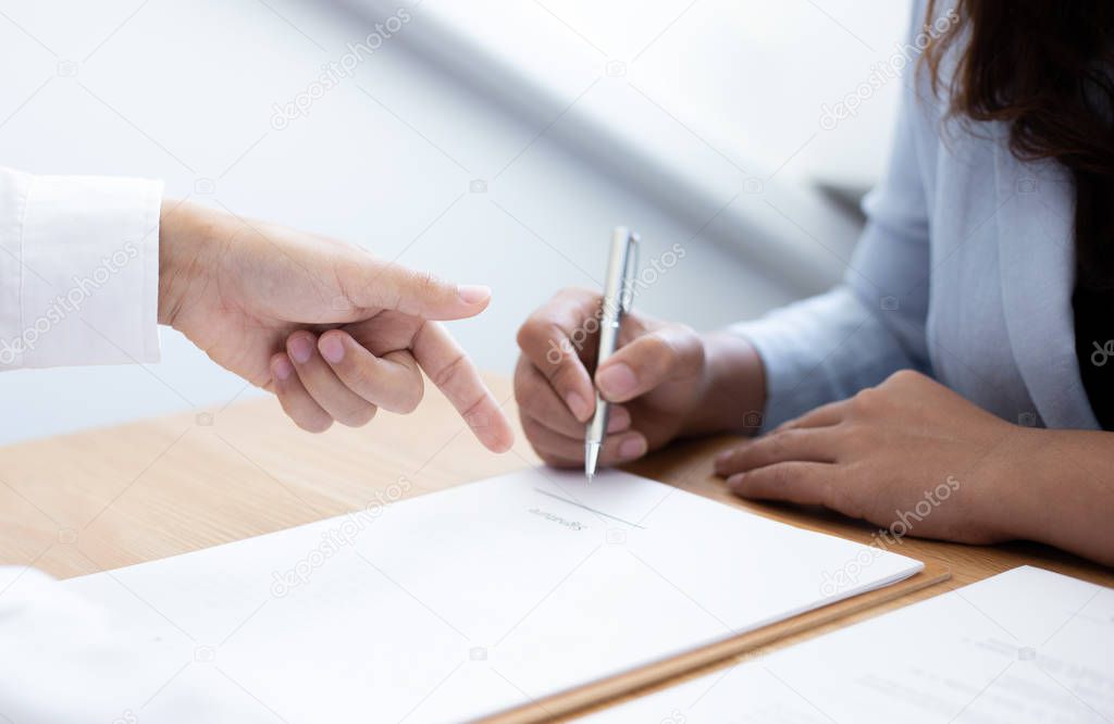 Business people negotiate for customers to sign land sales contracts, Property purchase contract of concep