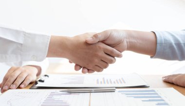 Successful ,The image of business women and men shake hands, Shaking hand concept.
