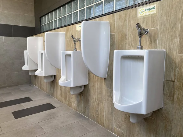 Men White Urinals Design Close Row Outdoor Urinals Men Public Royalty Free Stock Photos