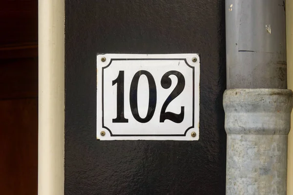 House number 102 — Stock Photo, Image