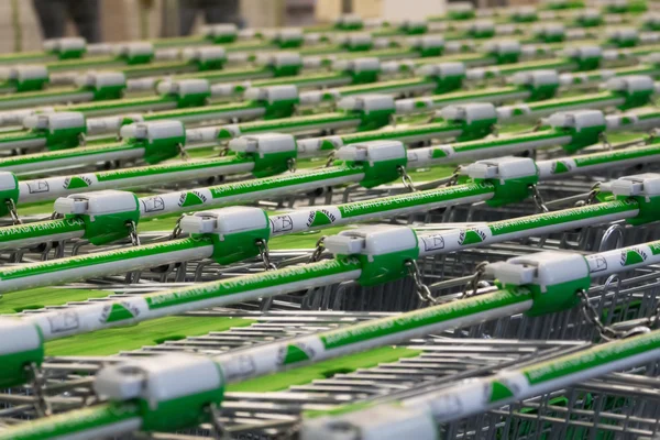 Row of shopping trolleys — Stock Photo, Image