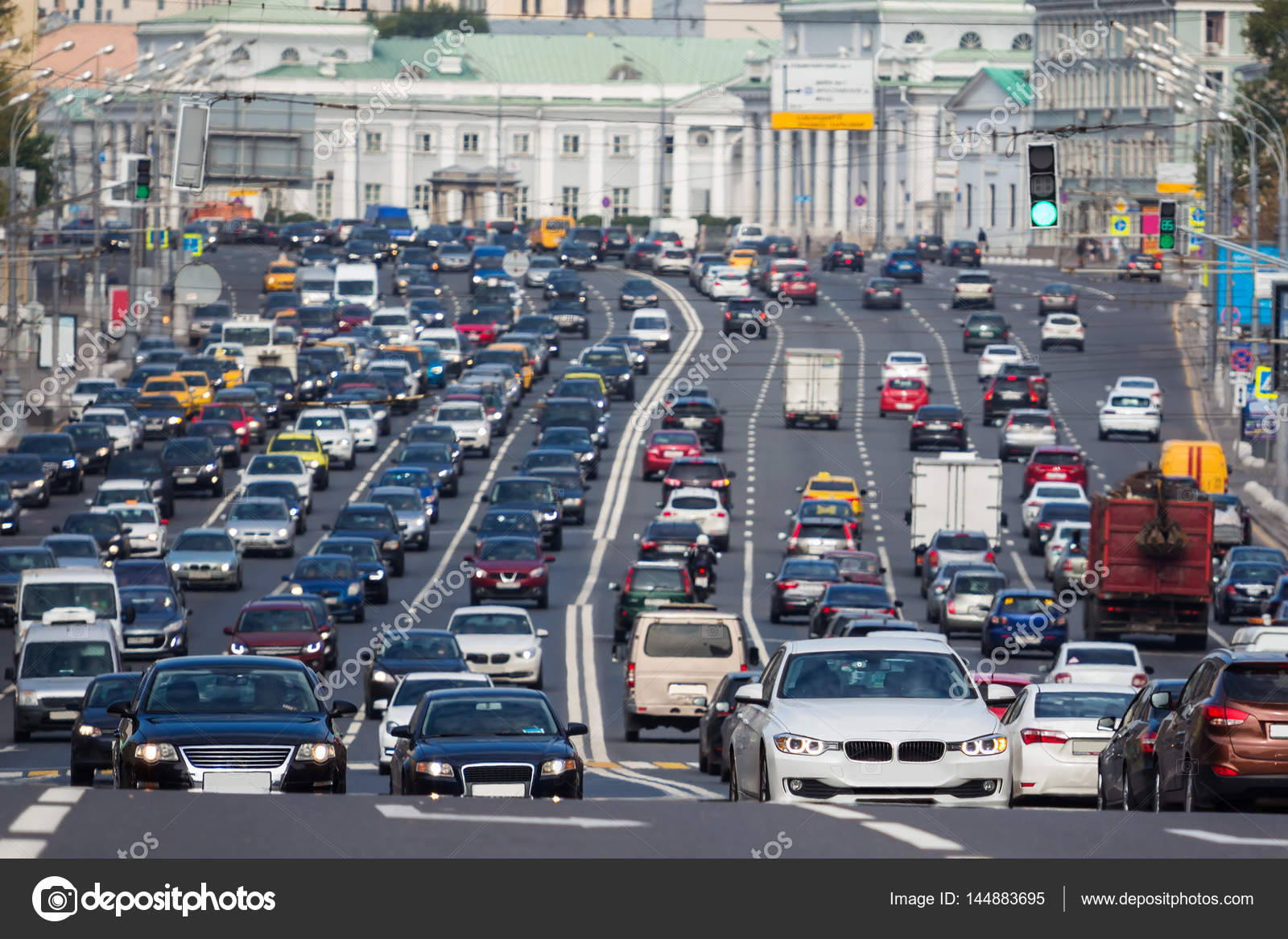 Congested with cars multilane road Stock Photo by ©wastesoul 144883695