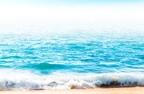 Ocean surface with waves near the beach