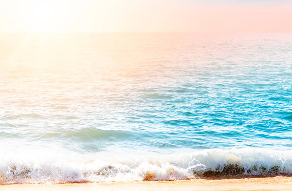 Ocean wave with foam in the morning