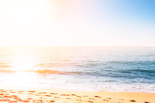 Sand coastline against the sun