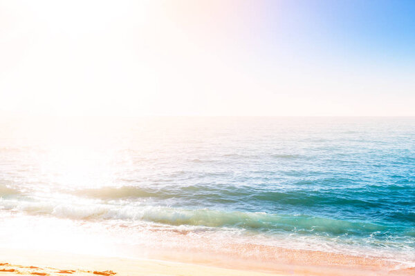 Sand coastline against the sun