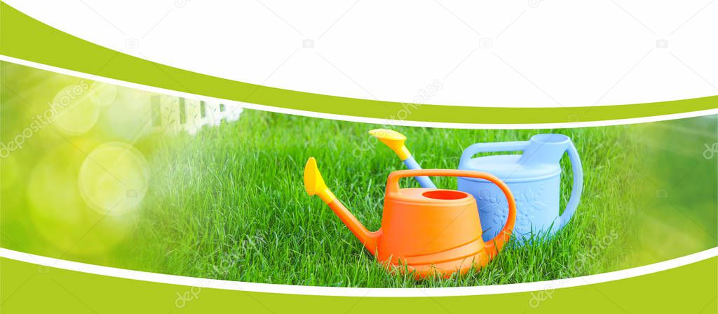 watering can and grass