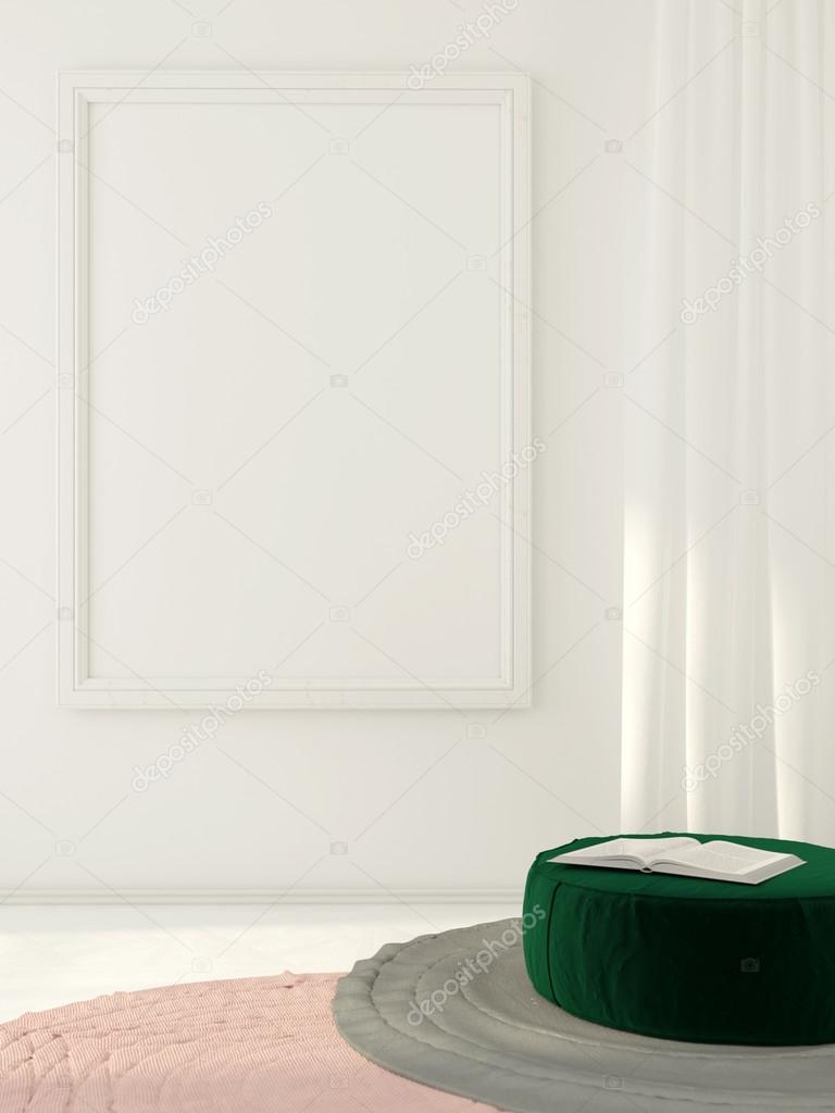 White frame on the wall and green pouf