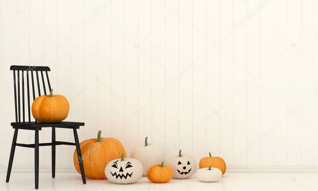 Interior with a black chair and pumpkins