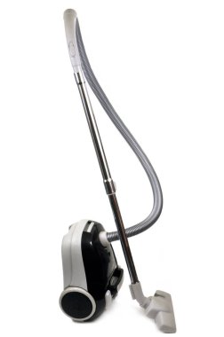 Beyaz arkaplanda teneke süpürge yakın çekim 