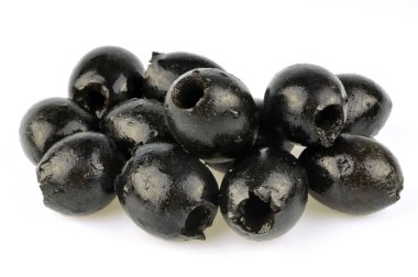 Pitted black olives close up on white background