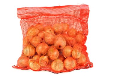 Bag of white onions close-up on white background 