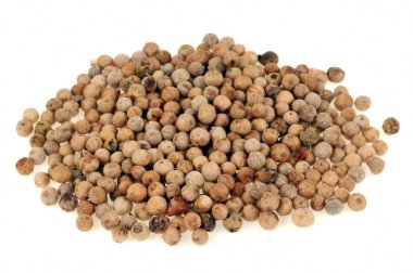 Mustard seeds close up on white background 