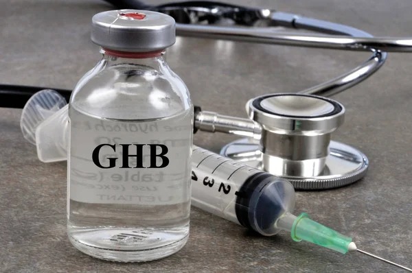 Ghb Bottle Next Syringe Stethoscope Close Royalty Free Stock Photos