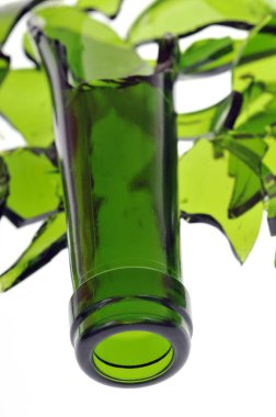 Broken glass bottle close up on white background 