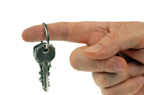Bunch Keys Held Finger Close White Background — Stock Photo, Image