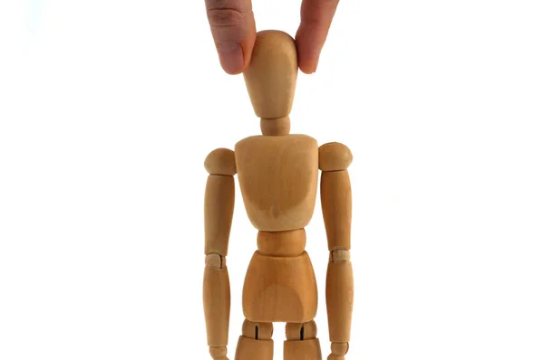 Selection Concept Wooden Mannequin Held Two Fingers Close White Background — 图库照片