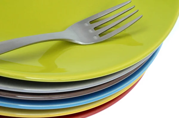 Plates Different Colors Fork Stacked White Background — Stock Photo, Image