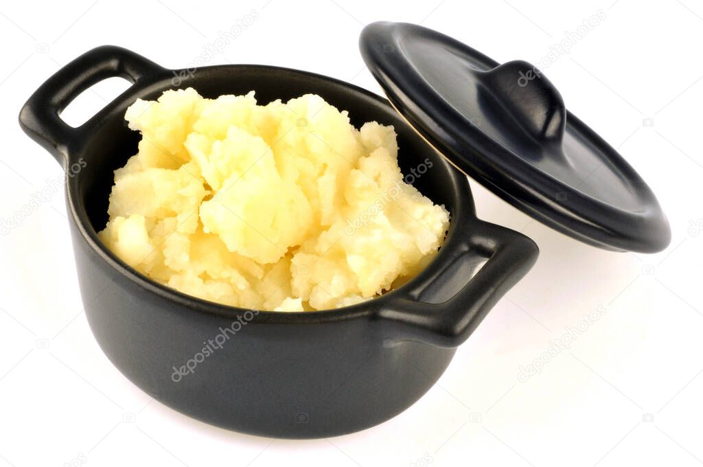 Homemade mashed potato ramekin close-up on white background