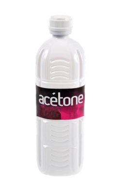 Plastic bottle of acetone close up on white background clipart